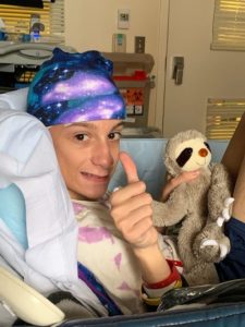 boy wearing nillynoggin eeg cap during an eeg