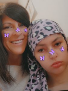 Heather and Hannah, creators of the NillyNoggin EEG Cap, during an EEG